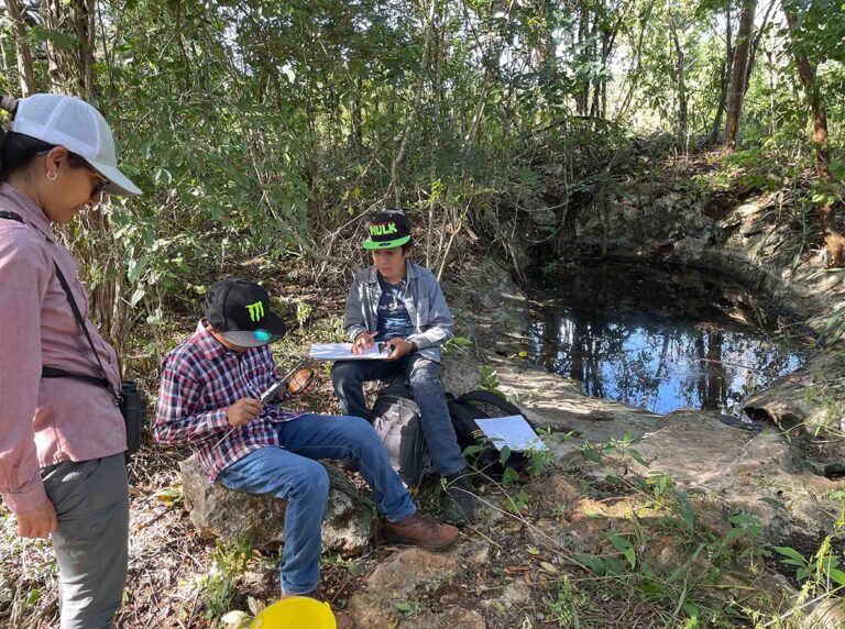 Students_Conserving_Nature_Alejandra_Monsivais_oversees_students_taking_data_on_mud_turtles_captured_in_forest_sinkhole_Taggert_Butterfield